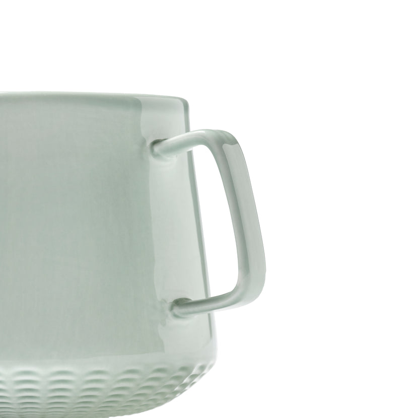 Serax Nido cappuccinokop groen – detailfoto van het groene glazuur op de koffiekop